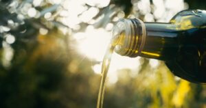 How Extra Virgin Olive Oil Helps to Protect Your Brain, According to Science Green olive oil and olive oil concept