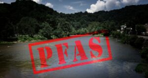 Georgia's Forever Chemical Cover-Up: What We Now Know Red PFAS ( Forever Chemicals ) stamp with a river in the background -- water contamination concept