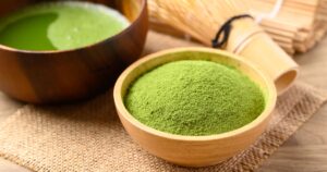 What Matcha Actually Does to Your Body, Explained Matcha green tea powder and tea with chasen (bamboo whisk)