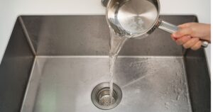 Why Pouring Hot Water Down The Sink is a Bad Idea Pouring hot water from a pot down the sink