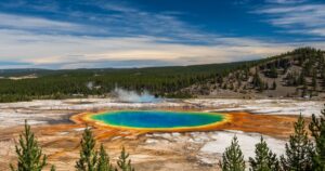 Yellowstone Supervolcano Starts Showing Previously Undetected Seismic Activity A beautiful view of a Yellowstone National Park, Midway Geyser Basin in Wyoming USA