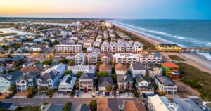9 U.S. States Where People Move In and Never Want to Leave Wrightsville Beach, North Carolina, USA at dusk.