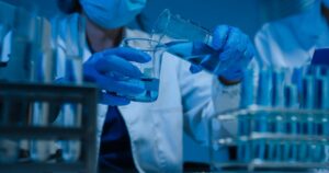 Scientists Trigger Bone and Joint Regrowth in Mammals With a 2-Step Serum scientist working in a lab