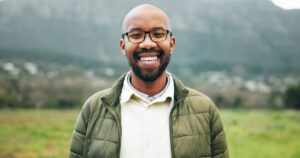 The Two Situations That Reveal Someone's True Character Every Time Smiling confident adult man