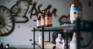 20+ Toxic Things in Your Home You Should Remove Right Now Discover an abandoned industrial room featuring shelves of toxic chemical bottles and graffiti walls.