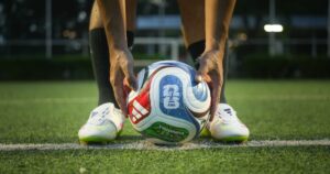 Woman Claims the 2026 World Cup Logo Already Reveals the Winner — Here's Why Bangkok, Thailand - 17 October 2025: Adidas launch "Trionda" the official match ball for Fifa World Cup 2026 that co-host with USA, Canada and Mexico. It on the football training pitch.