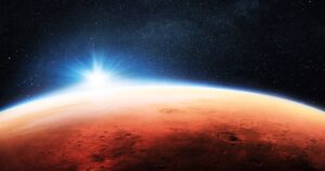 Amazing red planet Mars with craters and beautiful blue sunset in space with stars. New planet Mars. Travel to Mars, creative idea