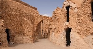 Mysterious 7,000-Year-Old Stone Circle Found in the Middle of Sahara. Scientists Say It Shouldn't Exist Explore the ancient desert ruins in Tunisia, showcasing historic architecture.