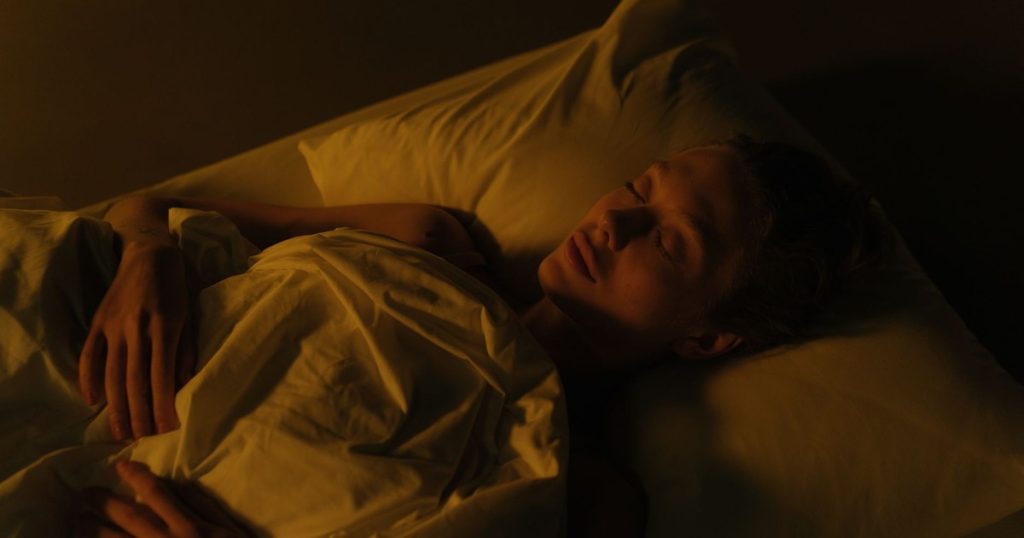 Sleeping With a Fan On? Doctors Share What That Does to Your Body and Health - Featured image
