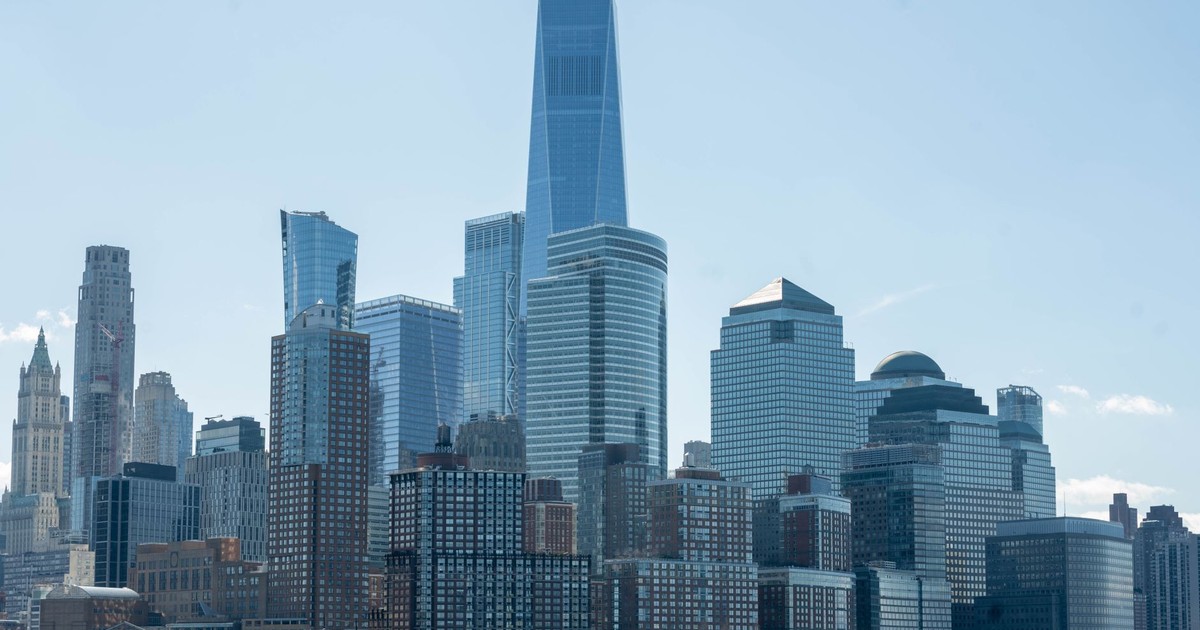 Stunning daytime view of New York City skyline featuring One World Trade Center.