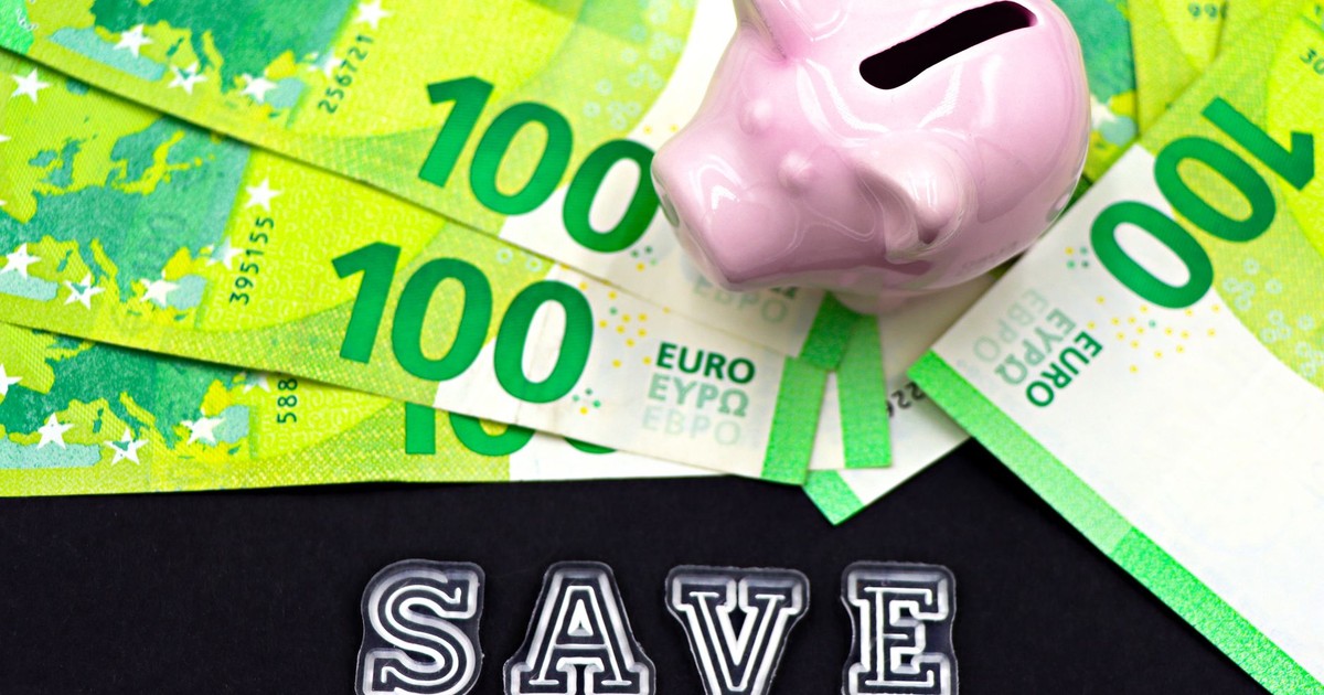 A piggy bank on euro bills with 'save' text highlights money saving concepts.