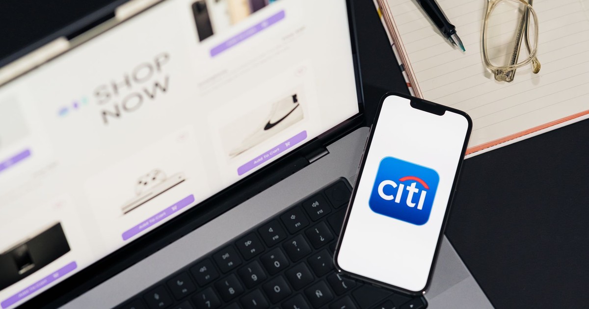 Laptop and smartphone showcasing online shopping and Citi mobile banking app