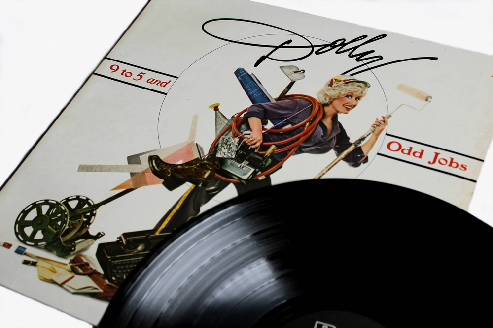Miami, FL, USA: July 2021: Country artist, Dolly Parton music album on vinyl record LP disc. Titled: 9 to 5 and Odd Jobs album cover