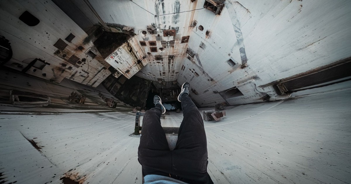 A thrilling perspective of urban exploration from a high structure, showcasing adventure.